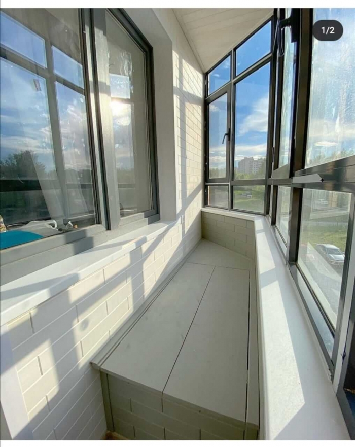 Остекление балкона ламинированными окнами