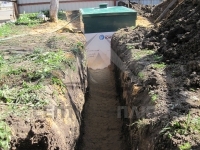 Установка септика Юнилос с прокладкой канализационных труб от дома до очистного сооружения