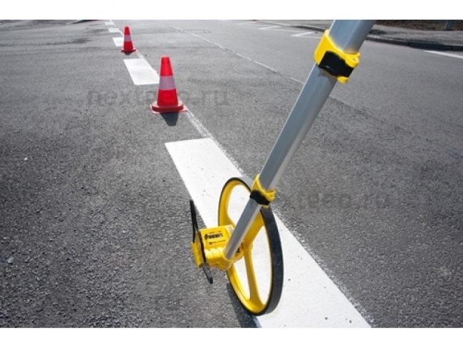 Дорожное колесо (курвиметр) значительно облегчит измерение расстояния, площади выполненных работ  